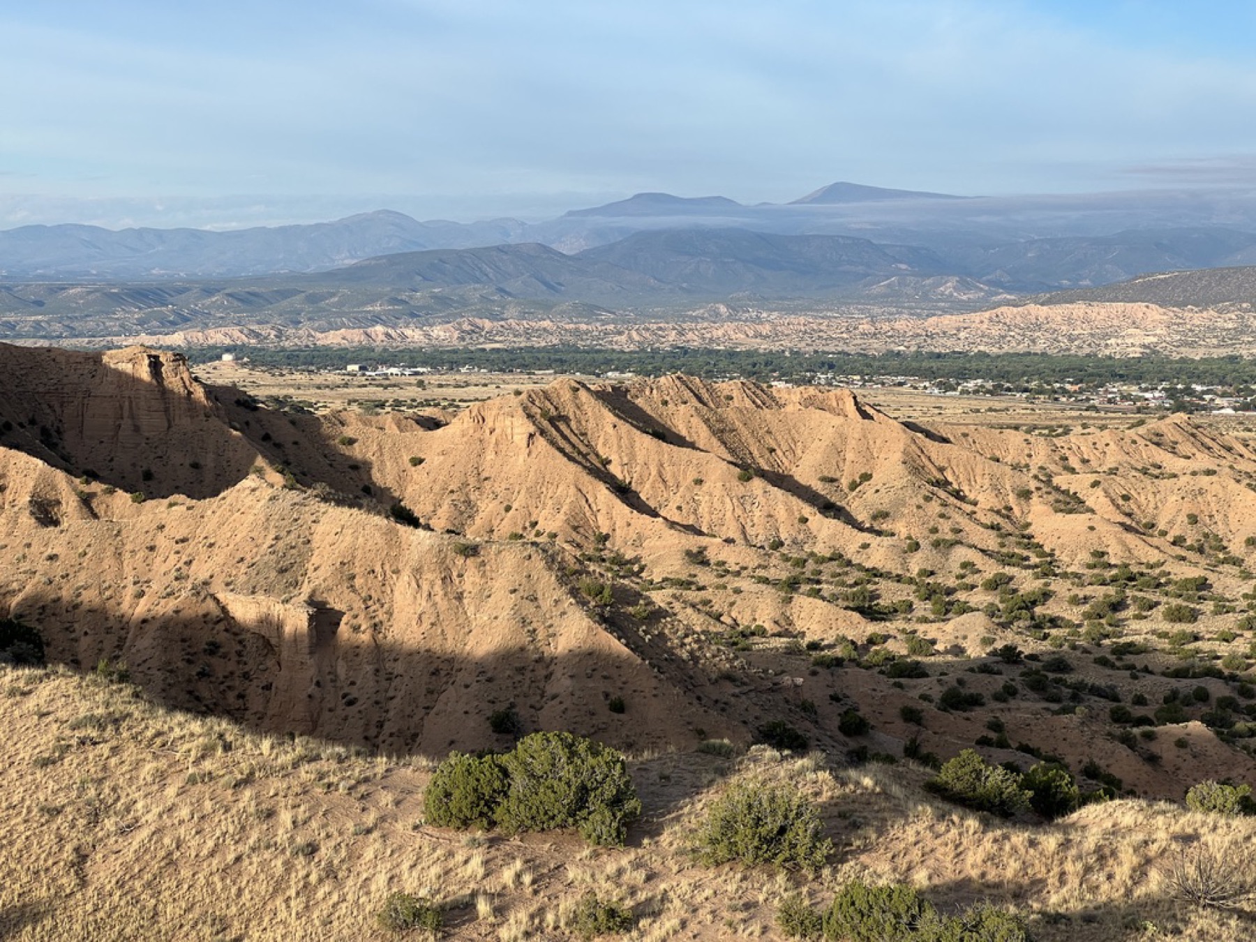 Badlands and valley north of Española, New Mexico, from the air