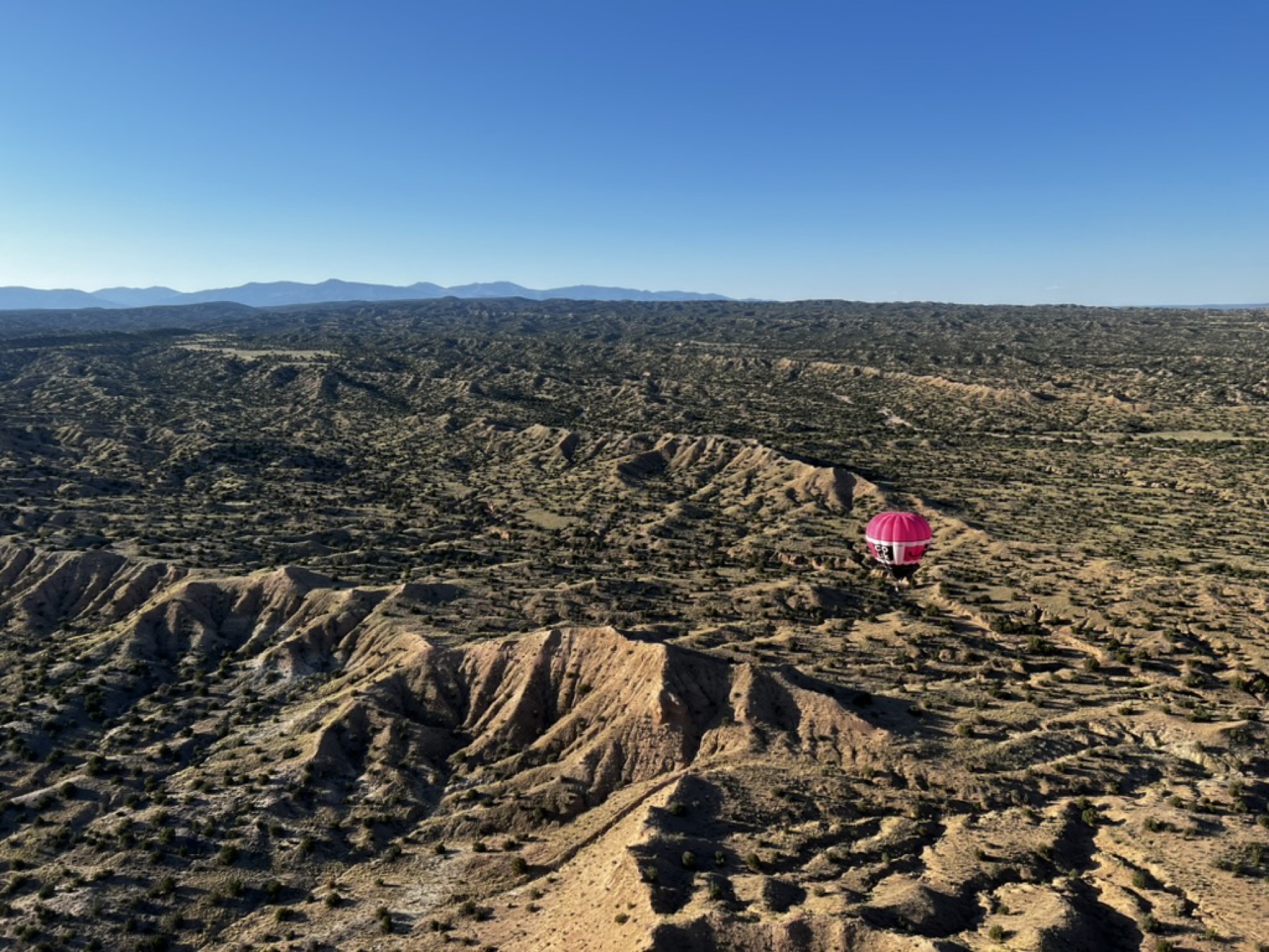 A balloon over the hills north of Española